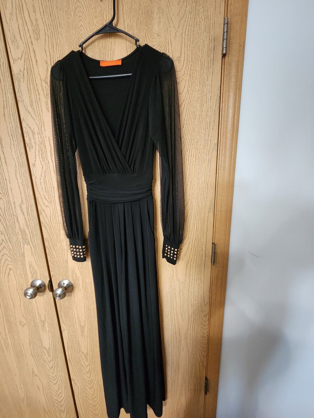 Arancia Black Long-Sleeve Jumpsuit with Studded Cuffs